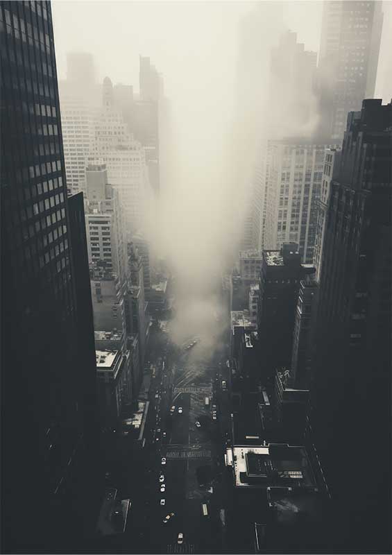 Towering skyscrapers with mist in a city | Metal Poster