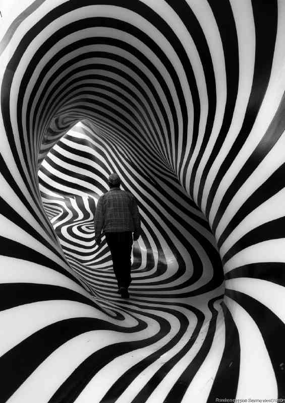 Man walking through the swirly tunnel | Poster